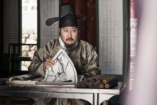 Song Kang Ho dans le rôle de NaeKyung, le meilleur liseur de visage du Joseon